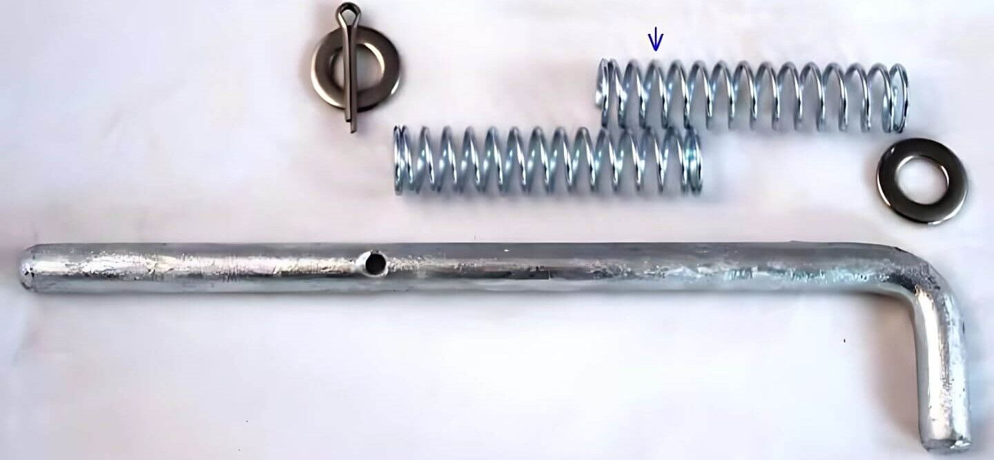 Federriegel-Baugruppe - Einstellen der Federvorspannung Federriegel-Baugruppe - Einstellen der Federvorspannung